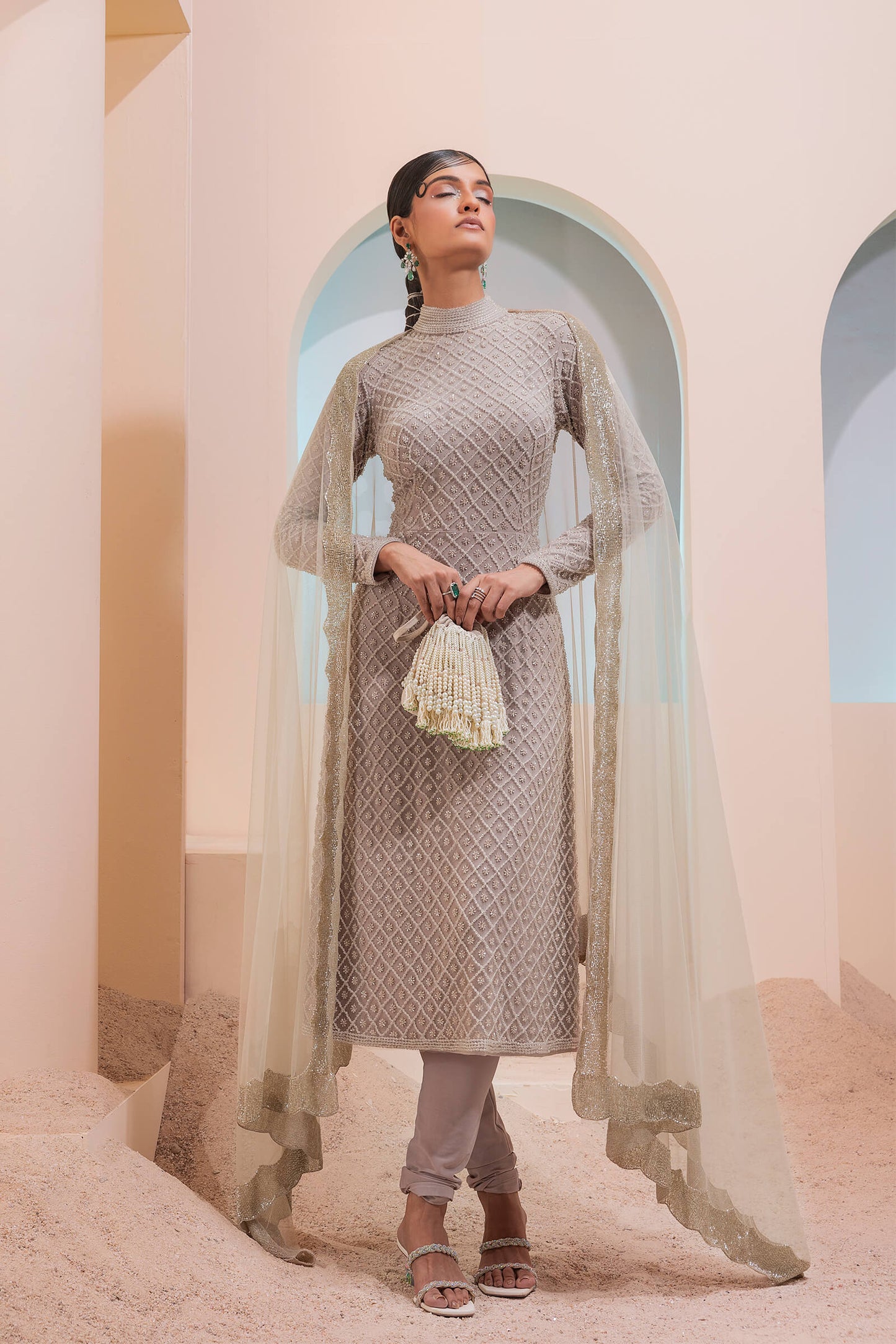 Stone Grid Work Tunic With Cutout Back Paired With A Lycra Churidar And Scalloped Tulle Dupatta