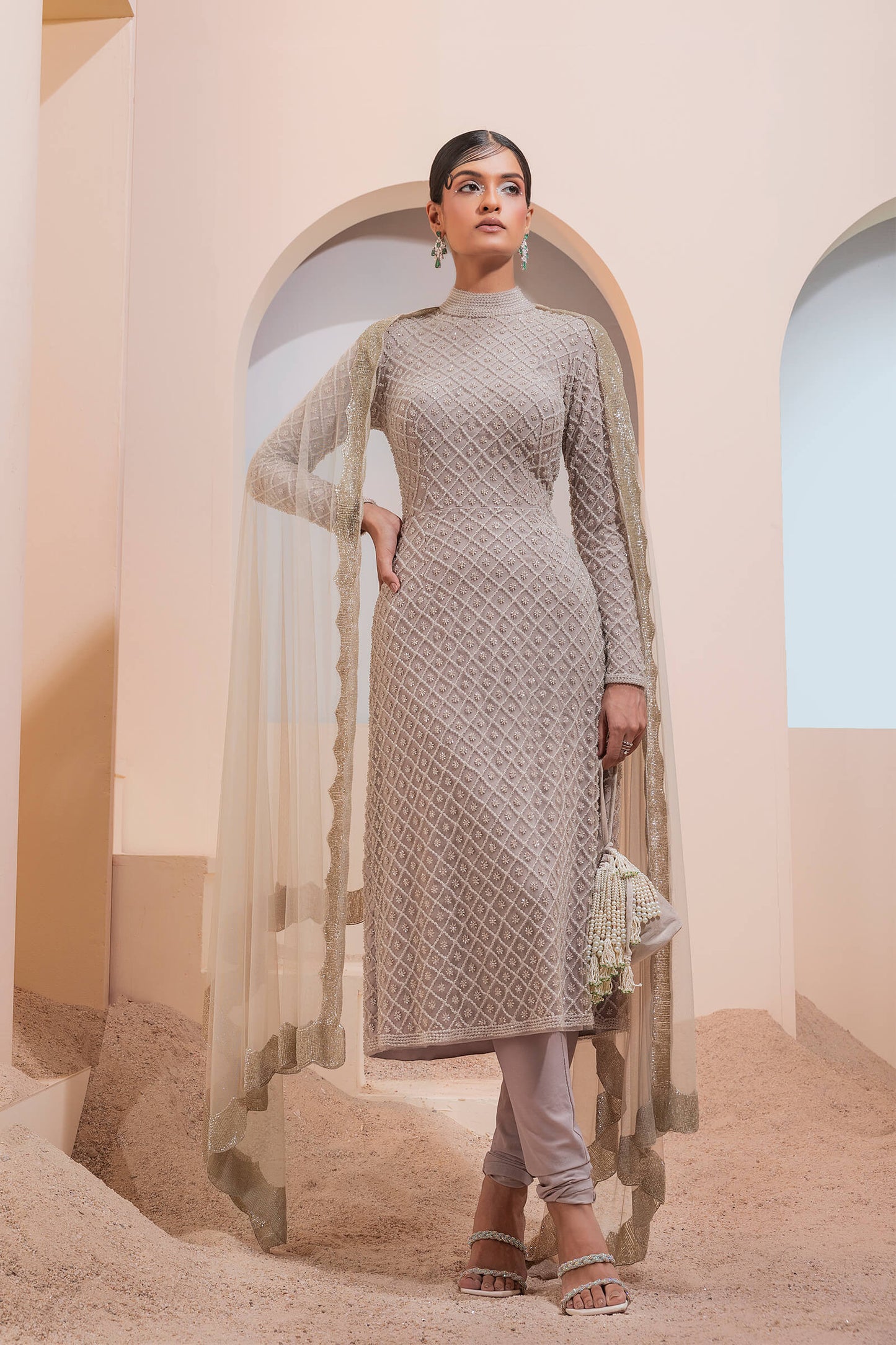 Stone Grid Work Tunic With Cutout Back Paired With A Lycra Churidar And Scalloped Tulle Dupatta