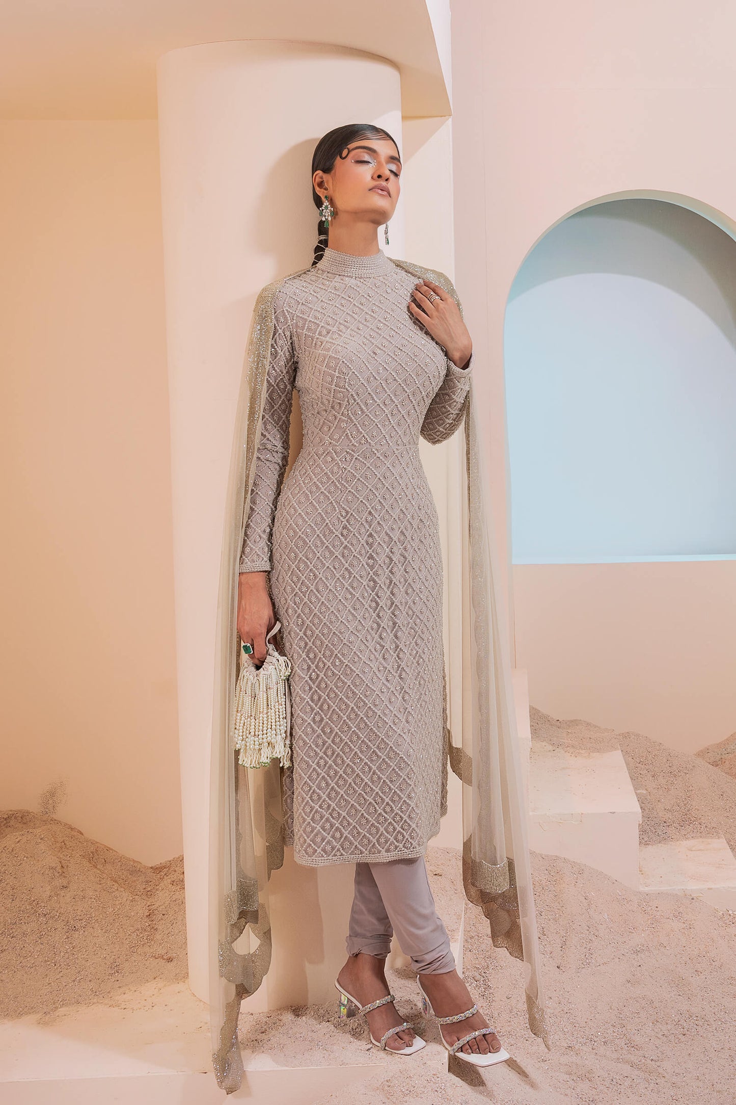 Stone Grid Work Tunic With Cutout Back Paired With A Lycra Churidar And Scalloped Tulle Dupatta