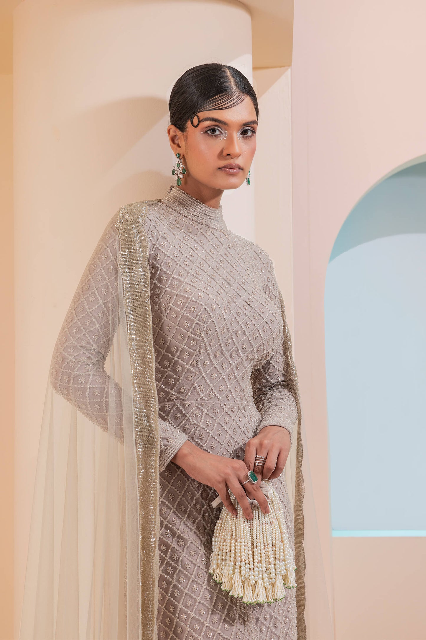 Stone Grid Work Tunic With Cutout Back Paired With A Lycra Churidar And Scalloped Tulle Dupatta