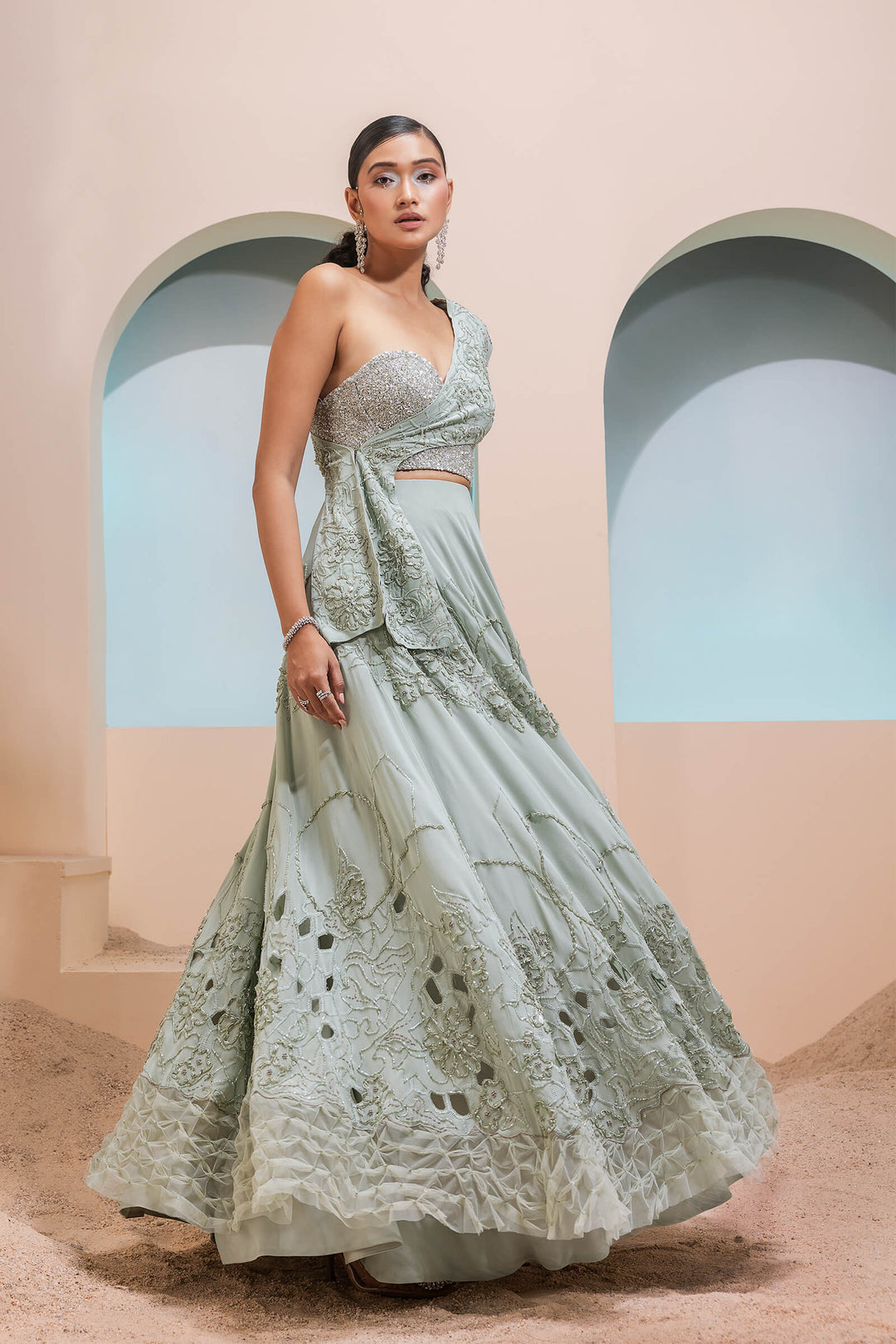 Mint Green Georgette Cutwork Lehenga With Cross Over Jacket And Beaded Corset
