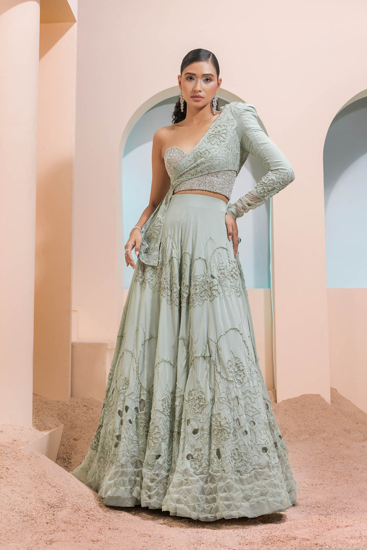 Mint Green Georgette Cutwork Lehenga With Cross Over Jacket And Beaded Corset