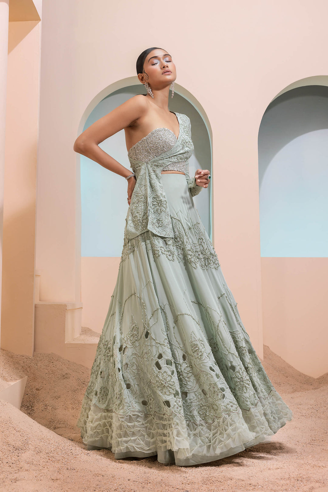 Mint Green Georgette Cutwork Lehenga With Cross Over Jacket And Beaded Corset