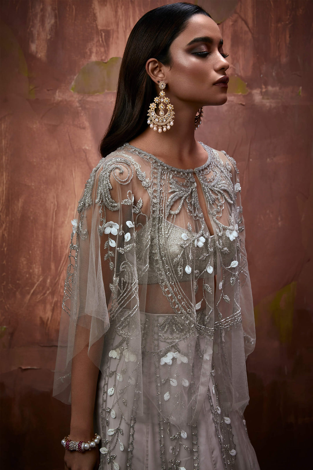 Stone Color Organza Lehenga With Tulle Inlaysand Delicate 3d Embroidery, Beaded Blouse And Tulle Cape