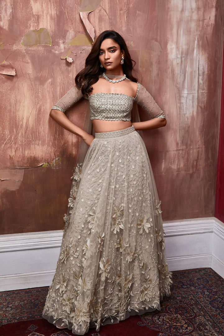Nude Layered Lehenga With 3d Flower Embroidery And Beaded Underlayer, Beaded Blouse And Embellished Dupatta