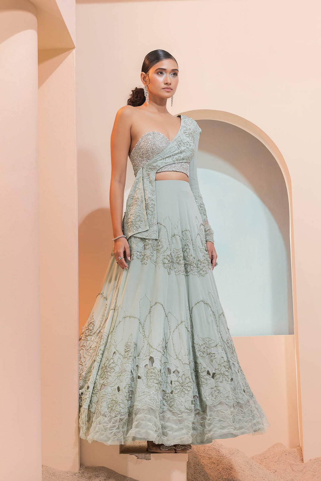 Mint Green Georgette Cutwork Lehenga With Cross Over Jacket And Beaded Corset
