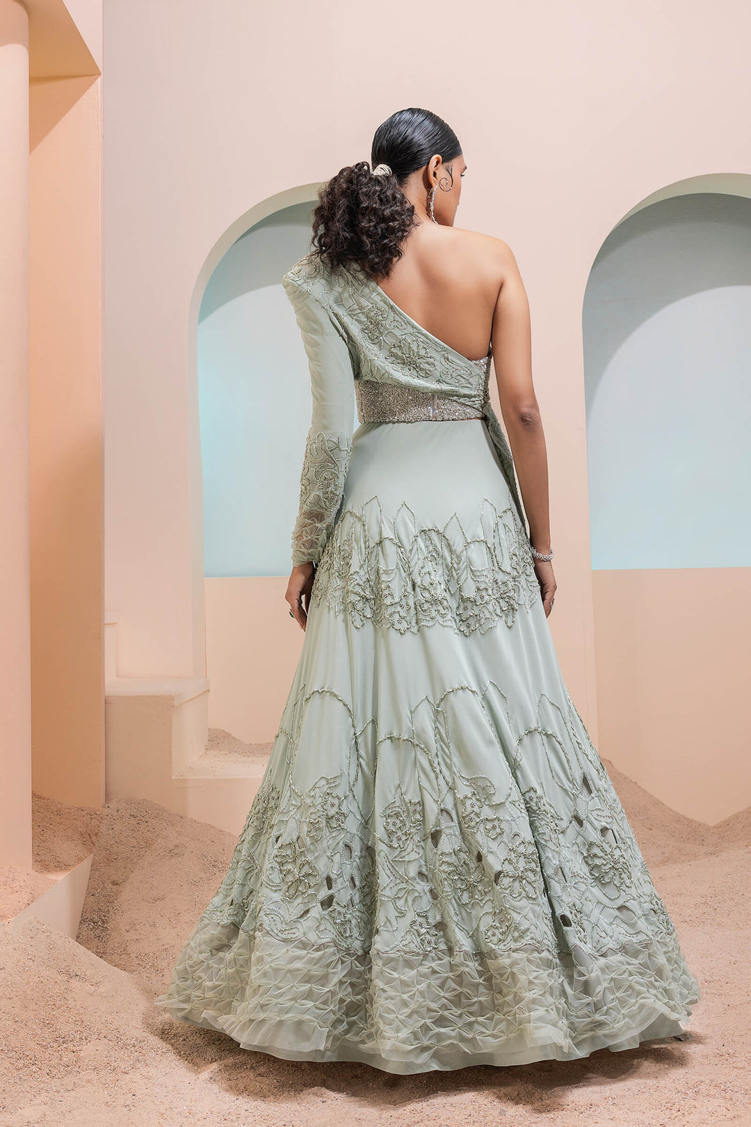 Mint Green Georgette Cutwork Lehenga With Cross Over Jacket And Beaded Corset