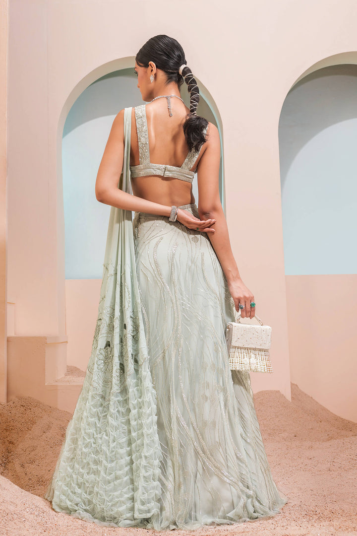 Mint Green Waves Lehenga With Iris Blouse And Smocked Armhole Dupatta