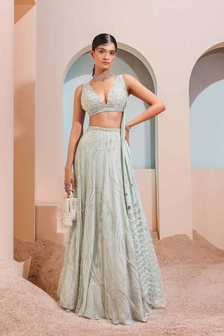 Mint Green Waves Lehenga With Iris Blouse And Smocked Armhole Dupatta