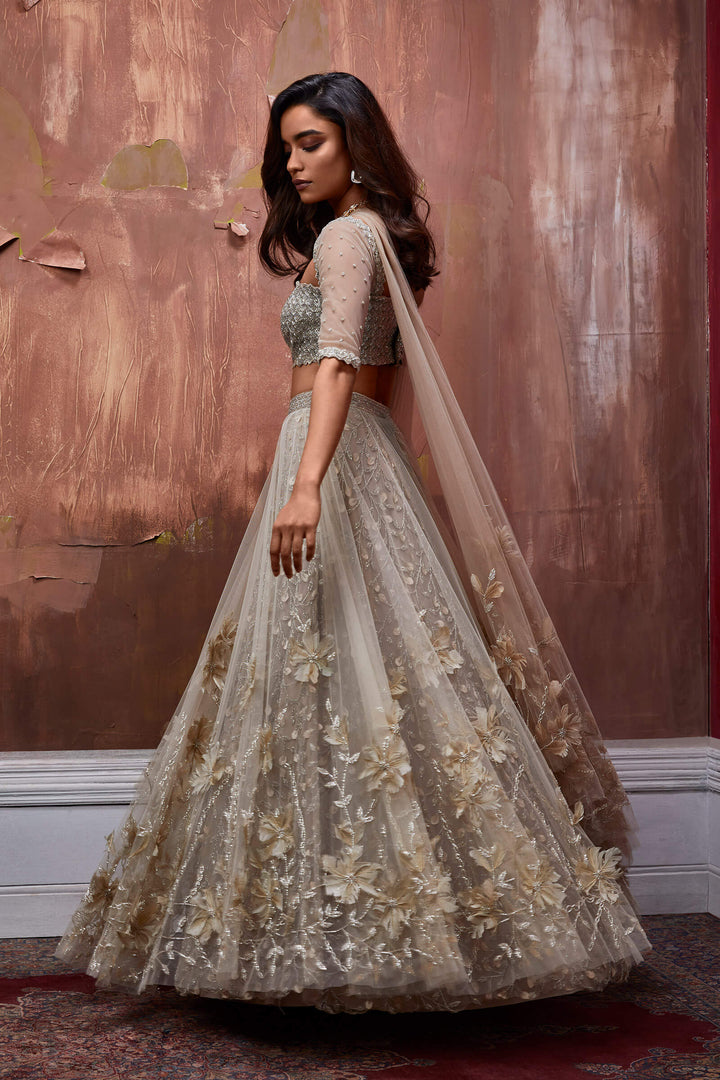 Nude Layered Lehenga With 3d Flower Embroidery And Beaded Underlayer, Beaded Blouse And Embellished Dupatta