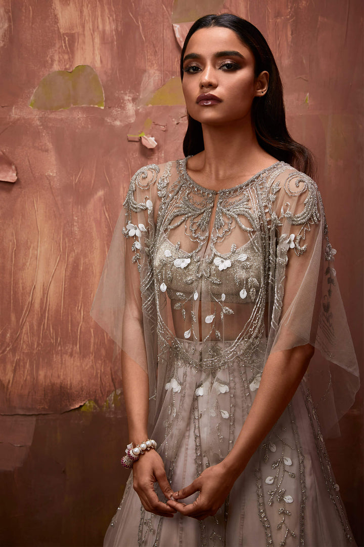 Stone Color Organza Lehenga With Tulle Inlaysand Delicate 3d Embroidery, Beaded Blouse And Tulle Cape