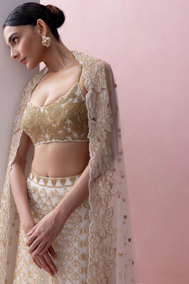 Ivory and Gold Fishtail Lehenga Set With Organza Applique and Crystals