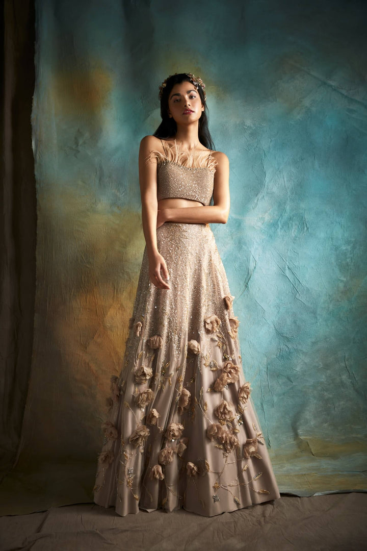 Nude Natasha Lehenga With Beaded Blouse And Faux Feathers
