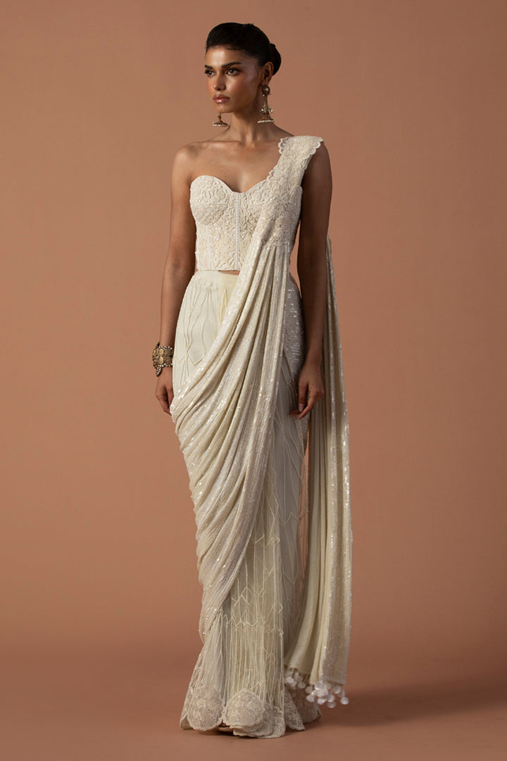 Ivory Tulle Saree With Sequins Aanchal And Beaded Corset  (Pre-stitched)