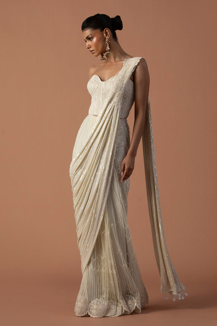 Ivory Tulle Saree With Sequins Aanchal And Beaded Corset  (Pre-stitched)