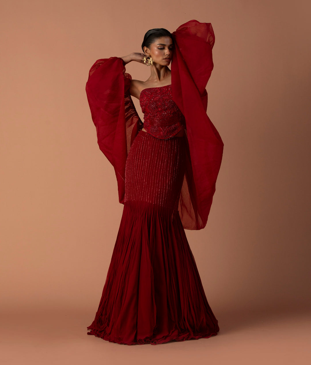 Red Fishtail Skirt With Georgette Inlays, Beaded Corset And Organza Bouffant Sleeves
