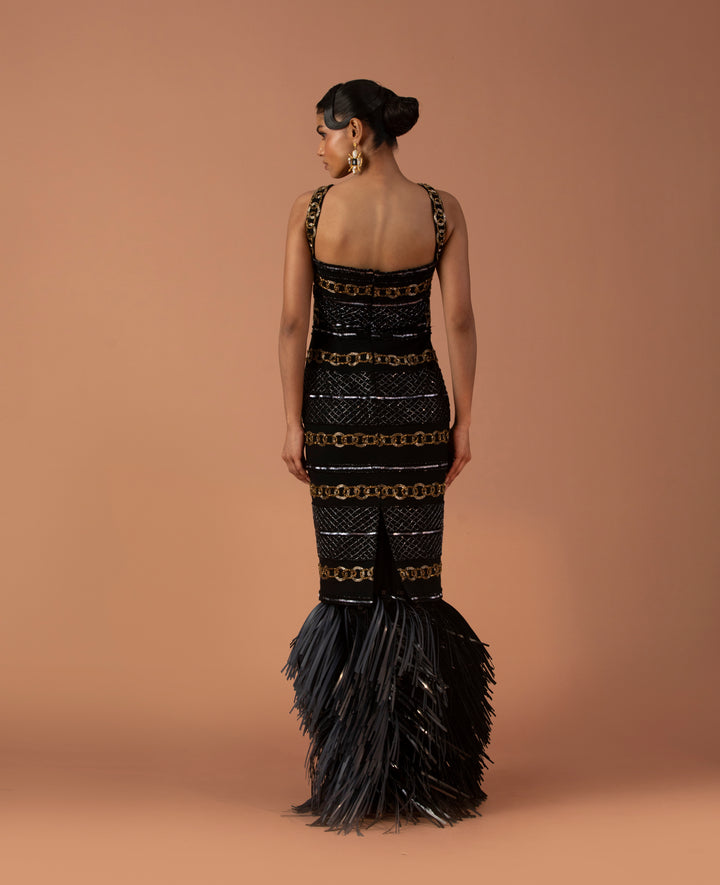 Black Pencil Dress Embellished With Bugle Beads And Black Leather Tassel Skirt