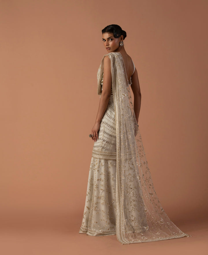 Ivory Sharara With Skirt Overlay With Thread Embroidery And Beaded Blouse