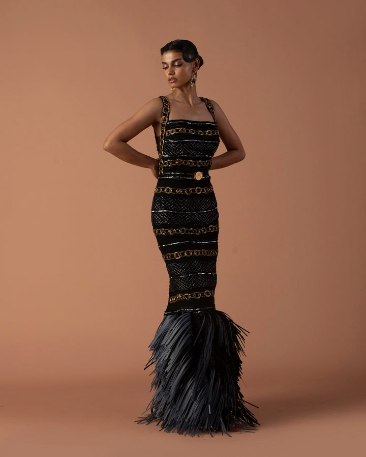 Black Pencil Dress Embellished With Bugle Beads And Black Leather Tassel Skirt