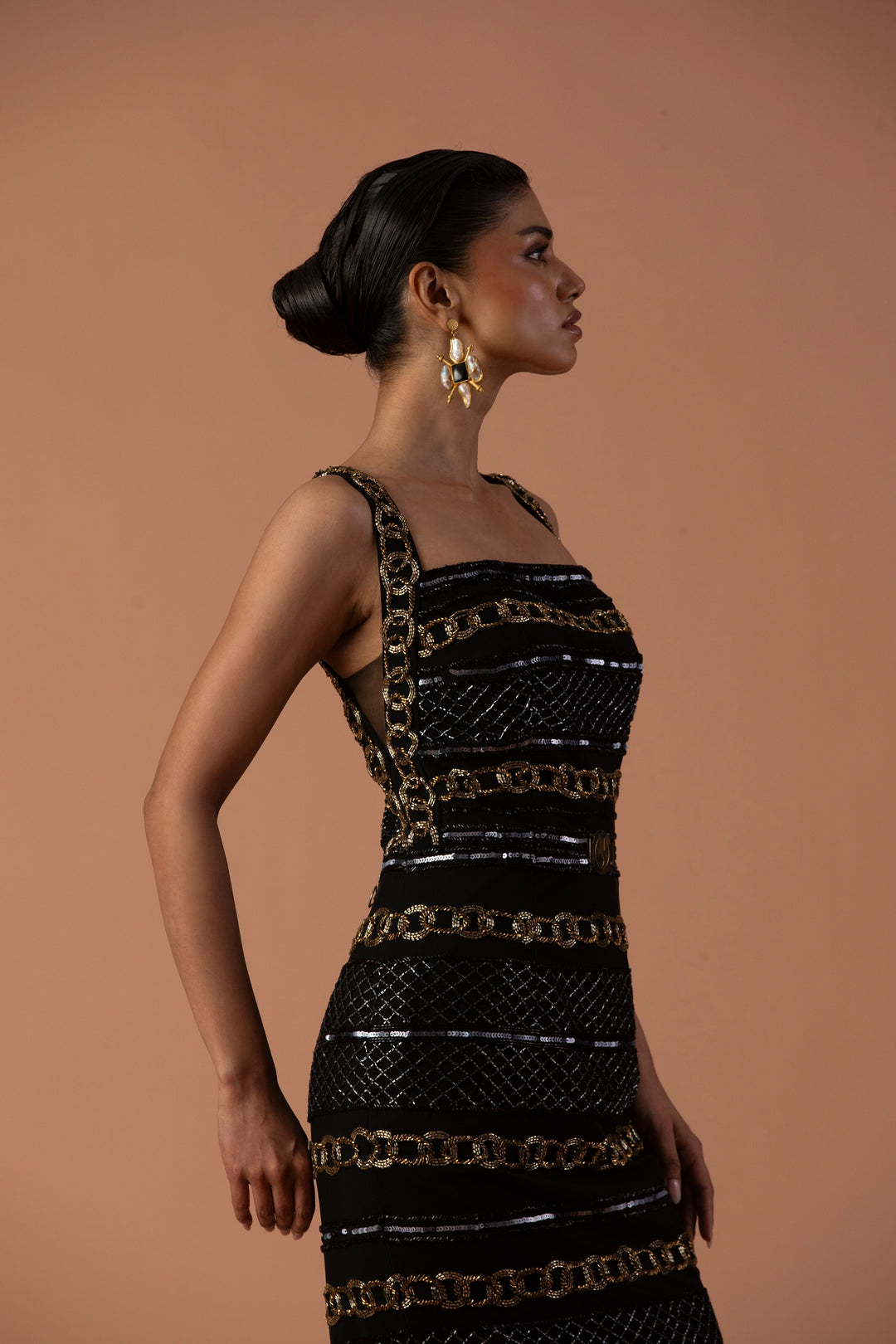 Black Pencil Dress Embellished With Bugle Beads And Black Leather Tassel Skirt